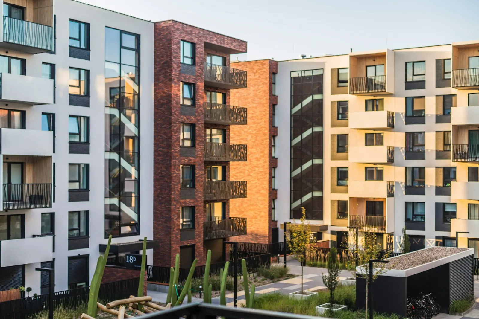 A modern apartment building managed by a property management company